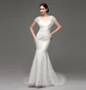 2015 Mermaid Lace Wedding Dresses in Stock Cap Sleeves Backless Bridal Bridal With Big Bow Vneck Designer Wedding Dress2857772