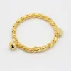 Bracelet à charnière poli haut or jaune 18 carats rempli de bracelet cloche de bébé de 4 mm périmètre intérieur 4,33 pouces