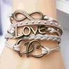 bracelet de mode Coeur lumineux multi-bracelets ashion Bijoux Cordon en cuir Amour Amitié Bracelet à breloques infini Lots en argent Style mixte