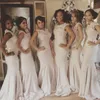 Nya Afrika Lace Bridesmaid Klänningar 2016 Ärmlös Sweep Train Mermaid Formell Evening Prom Kappor Junior Maint of Honor Dress med Bow Belt