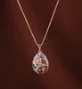 Carillons Collier saphir Bola mexicain Tout forage Collier pendentif gouttelettes d'eau creuses Collier long en cristal rose