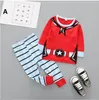 Kids Boy Girl Christmas Pajama Set Långärmade Toppar Striped Pant Nightwear Toddler Baby Boys Tjejkläder