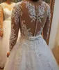 Luxury Pearls Lace Appliqued Wedding Dresses with Detachable Skirt Short Wedding Dress Sheer Jewel Neck Illusion Long Sleeves Pearl Belt