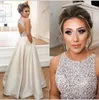 Jewel Top con cuentas Vestidos de baile largo Puffy lentejuelas Crystal Floor Length Prom Vestidos Couture Keyhole Volver Vestidos Evening Wear Real Party 2018