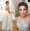 Jewel Top Beaded Prom Dresses Long Puffy Sequin Crystal Floor Length Prom Gowns Couture Keyhole Back Dresses Evening Wear Real Party 2018