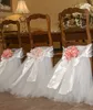 純粋な白タツゥチュールチェアサシサテン弓サッシカスタムメイドチェアスカートフリルウェディング装飾チェアカバー誕生日パーティー用品