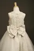 2016 Belle Dentelle Fleur Fille Robes Robe De Bal Filles Pageant Robes Enfants Tulle Arc Étage Longueur Communion Robe De Fête De Mariage