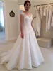 2020 Wedding Dresses Lace Appliques Illusion Neck Cap Sleeves Country Beach Sweep Train Button Back Formal Plus Size Bridal Gowns Custom