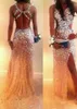 2018 Sparkly Beaded Shathed Prom Dresses Silver Long Sexy Avond Party Jurken met Cross Back Side Slit Formele Gelegenheid Toga's Custom Made