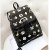 Moda Brand New Black White PU Couro Mochila Mulher Listrado Feminino Escola Mochilas Tassel Backpack Stripe Print College Wind Bag