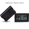 Atacado-Mini Digital LCD Indoor medidor de umidade de temperatura termômetro higrômetro calibre