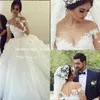 Cheap Winter A-Line Ball Gowns Wedding Dresses with Sheer Long Sleeve Vintage Lace Princess Plus Size Arabic Dubai Backless Vestidos