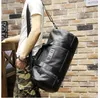 The factory direct selling brand of outdoor leisure bag leather bags for large handbag fashion metrosexual man Korean black leathe2266495