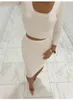 Ropa de moda para mujer vestido de dos piezas de manga larga de falda corta paquete delgado nalgas de fiesta sexy damas ropa delgada