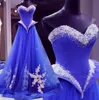 Royal Blue Long Aftonklänningar Tulle Peplum Elegant Beading Sequins Golvlängd En Line Lace Appliques 2019 Vestidos de Festa Ribbon.