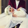 Arábia Saudita árabe Mangas Compridas Modest Muçulmano Vestidos de Casamento Contas de Rendas Sobre Saia Sereia Vestidos De Noiva Com Mangas Destacáveis ​​Trem Dubai