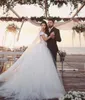 Arabic Big Ball Gown Wedding Dresses Off the Shoulder Nude Lined Top Romantic Lace Appliques Soft Tulle Puffy Bridal Gowns Corset Back