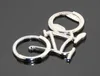 100pcs 귀여운 유행 자전거 자전거 금속 애호가 병따개 자전거 애호가 자전거 타는 사람을위한 열쇠 고리 자전거를위한 창조적 인 선물