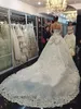 Frete Grátis New Luxury Elegante A-line Princesa Alta Neck Sem Mangas Beading Catedral Trem Vestidos De Noiva De Tule