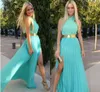 Blå Halter Neck Party Dresses Ärmlös Sexig Sida Split Ruffles Zipper Chiffon Long Prom Klänningar Billiga En Linje Golvlängd Evening Klänningar