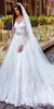 2016 Robes de mariée victoriennes modestes Sexy Sheer Lace Applique Jewel Neck Manches longues Superbe Bling Beaded Waist Une ligne Robes de mariée blanches