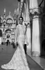 Inbal Dror Vintage Lace Sheer Castle Mermaid Bröllopsklänningar 2018 Modest High Neck Långärmad Sweep Train Princess Bridal Dress
