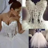 Corset Ball Gown Wedding Dresses Sweetheart Pärled Crystal Tulle Bling Bröllopsklänningar LACE-UP Back Custom Made Dress Arabic237D