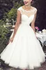 Lunghezza tè Abiti da sposa vintage anni '50 Cap Sleeve Gioiello Collo Pizzo Tulle Una linea Abiti da sposa classici corti Custom Made271k