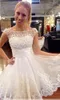 2022 Krótki koktajl Party Dresses Perły Sheer Neck Lace Aplikacja A-Line Backless Tulle Mini Prom Formalne sukienki Wieczór Suknie Celebrity