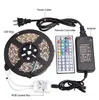 شرائط مقاومة للماء IP65 5M 300 LEDS 5050 RGB LED Strips 60 LEDS جهاز التحكم عن بُعد 12V 5A إمدادات الطاقة في الولايات المتحدة الأمريكية AU UK Plug3039