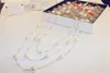 Flerlagers pärlhalsband koreanska märkesdesigner lång halssmycke för kvinnor tröja smycken