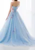 Light Sky Blue Strapless Prom Dresses With Colorful Appliques Beaded Ribbon Sash Lace Up Tiered Back Evening Gown Formal Party Dresses