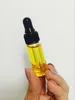 3ML Mini Botellas de vidrio ámbar Aceite Esencial cuentagotas recargables 4 colores