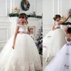ヴィンテージジュエルサッシレースネットの赤ちゃんの女の子の誕生日パーティーの聖体拝領のドレス子供フォーマルウェアホット新品