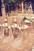 新しい魅力的なマウイの目的地の結婚式の椅子バックサッシーズカバーホワイトアイボリーカスタムメイドバンケットパーティーの装飾クリスマスバースデーchai5756831