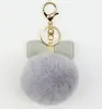 60pcs Bowknot Fur Pom Keychain Real REX Rabbit Fur Ball Key Chains Fur Key Ring Key Chain pour sac