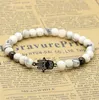 Hurtownie 6mm Natural White Howlite Marmur Kamienne Koraliki Micro Pave Cyrkony Fatima Hamsa Charm Bransoletki Dziewczyna Prezent