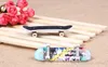 Hildren Speelgoed Animatie Achtergrond Model Vinger Board Truck Mini Lichtmetalen ABS Skateboard Speelgoed Vinger Skateboards C034