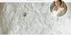 مصمم خمر الرباط فساتين الزفاف الخامس طوق طويلة الأكمام رخيصة الترتر مطرز شاطئ عارية الذراعين أثواب الزفاف 2016 جديد HT112
