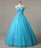 2017 New Sexy Blue Quinceanera Платья для бальных платьев с бисером Кристаллы Кружевные Сладкие 16 Платья 15 лет Пром Пром Сток 2-16 QS1044