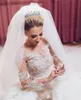 Lange mouwen Trouwjurken Saoedi-Arabië Dubai Kant 3D Floral Applique Kralen Land Bruidsjurken Sweep Train Plus Size Bridal Jurk