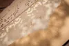 100pcs Gold Horizontal Laser Cut Widding Invitations CARTS KITS AVEC FLORA CROVE FAVORS PEARL PAPIER PAPIER POUR COMMOSSABLE9434832