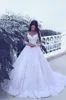 Sade Mhamad Sheer Neck Lace Applique Bröllopsklänningar 2017 Illusion Långärmad En Linje Brudklänningar Sweep Train Custom Made Wedding Vestidos
