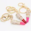 Fashion Rhinestone Crystal Lipstick Keyring Charm Bag Purse Car Pendant Key Chain Gift Free DHL WX-K03