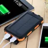 Lampy słoneczne Portable Bank Power 10000mAh Zewnętrzne Backup Battery Pack Dual Panel USB Ładowarka z 2gle Light Carabiner Compass