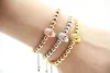 High Grade Jewelry Wholesale 6mm Real gold and White Gold-Plated Beads with Micro Zircon Inserts Skull Macrame Bracelets