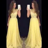 Abiti da ballo Lungo in pizzo giallo 2019 Collo alto trasparente Illusion Top Abiti da sera sexy Chiffon Abiti da cerimonia speciali per occasioni speciali