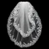 2016 voiles de mariage courts avec bord appliqué en dentelle et deux couches en stock voiles de mariée ivoire voiles blancs pour les mariées