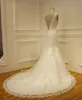 Appliques di pizzo Abiti da sposa a sirena Scollo a V con perline Schienale basso Cappella Treno Fit e svasato Abiti da sposa Vestido De Noiva Real Photo