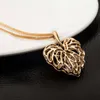 Hollow gold love leaf with shiny zircon necklace pendant Long necklace Alloy Gold Silver Sweater chain ornaments Clothing accessories